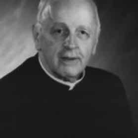 Father James Whalen of St. Thomas